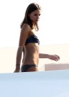 Ashley Greene - Black bikini candids on Valentino's yacht